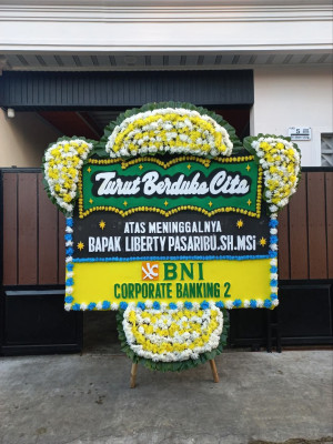 Papan Bunga Duka di Keagungan