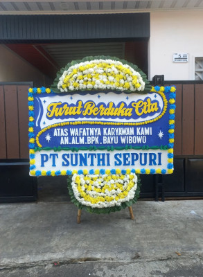 Papan Bunga Duka di Keagungan