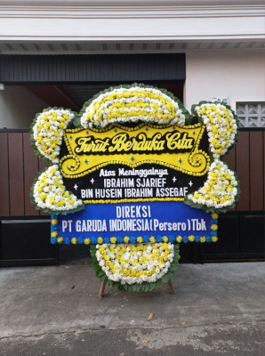 Papan Bunga Duka di Keagungan