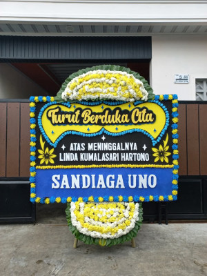Papan Bunga Duka di Keagungan